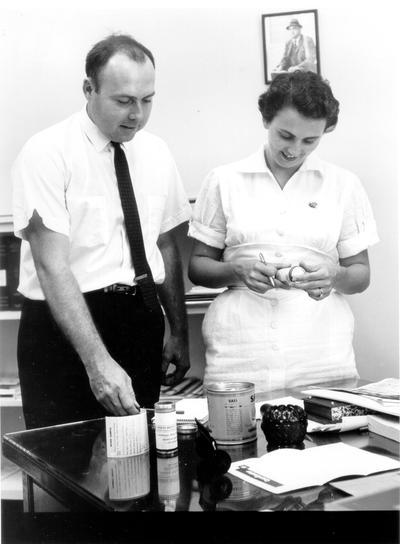 Hospitals and Medical; A nurse and doctor filling a prescription