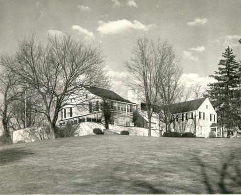 Houses; Unidentified; A huge white house with a well-kept lawn