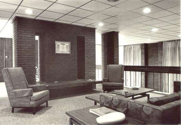 Interiors of Rooms; The upstairs lounge in a fraternity house