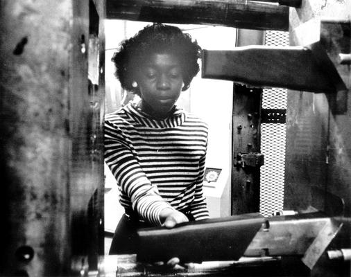 Irvin Industries; Close-up of a female worker