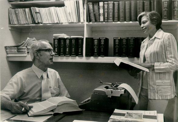 Kentucky Central Life Insurance Company; Two employees discuss work