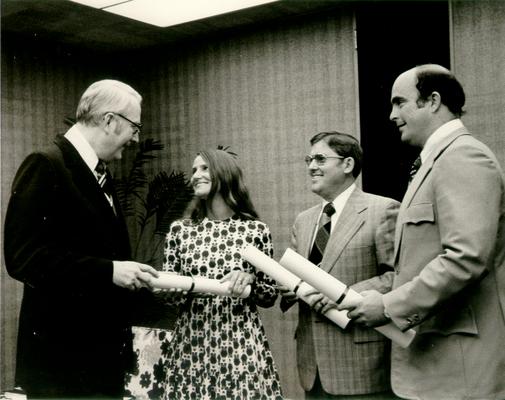 Kentucky Central Life Insurance Company; Employees being given certificates for doing a good job