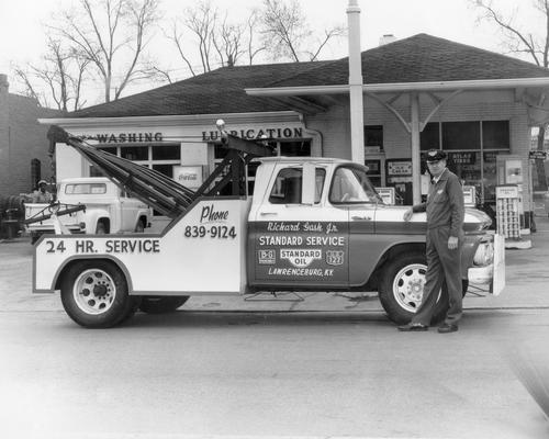 Lawrenceburg; Standard Service Station; A tow truck parked in front of the Standard Service Station