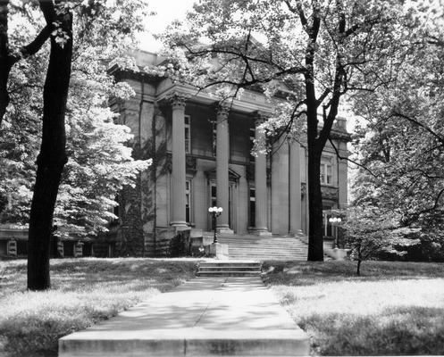 Lexington Public Library; The entrance to the Lexington Public Library surrounded by trees
