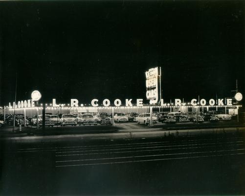 L. R. Cooke Car Dealership; The L. R. Cooke car dealership all lit up at night