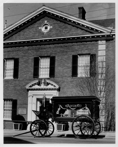 Milward Funeral Home; The funeral carriage parked in front of the building