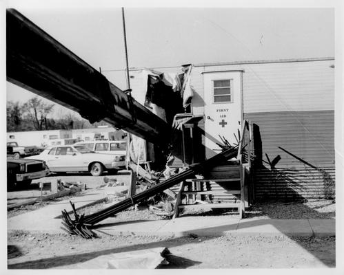 News Photographs; A huge metal beam crashes through a trailer