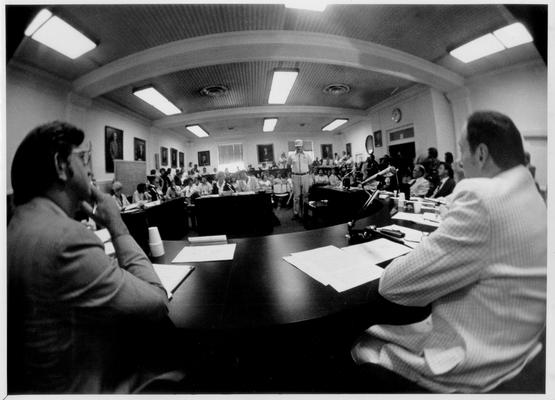 News Photographs; A fish-eye lens view of a town meeting