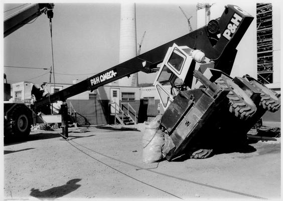 News Photographs; A large bulldozer overturned