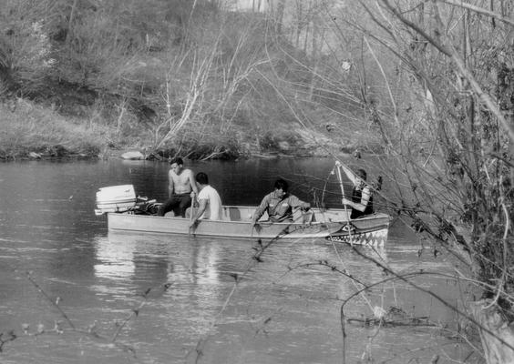 News Photographs; Police search the river