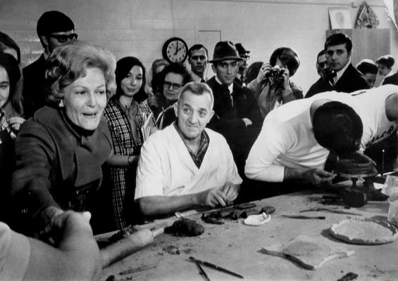 Nixon, Richard M. and Pat; Pat Nixon working with clay