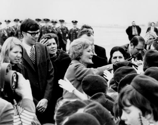 Nixon, Richard M. and Pat; Pat Nixon waves to the crowd