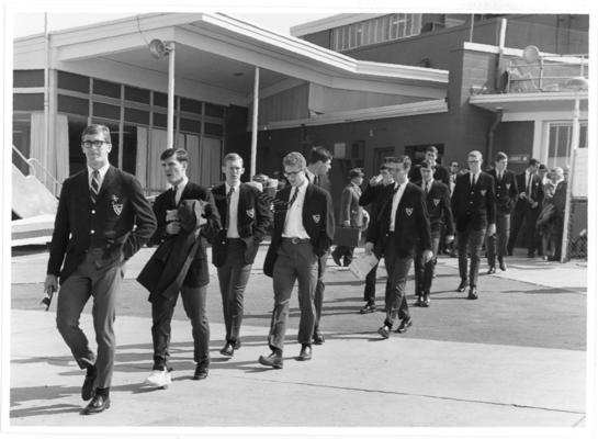 University of Kentucky; Basketball; The team crosses the tarmac to its plane