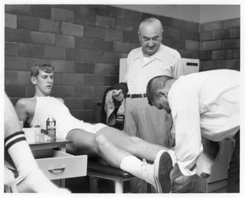 University of Kentucky; Basketball; A player's foot is iced and wrapped