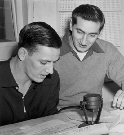 University of Kentucky; Basketball; Two men looking at some forms