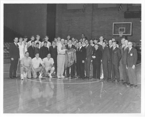 University of Kentucky; Basketball; Rupp celebrating an NCAA championship win