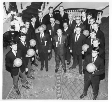University of Kentucky; Basketball; Twenty-two men in suit coats with a UK crest