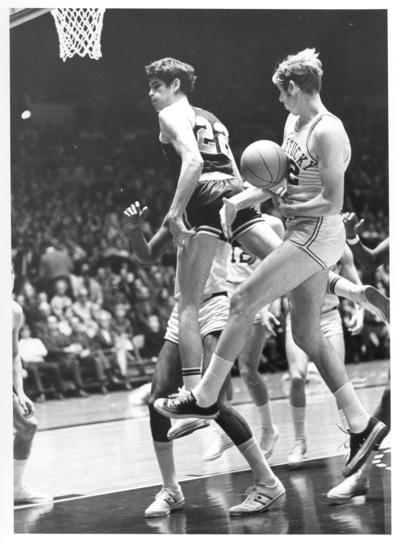 University of Kentucky; Basketball; UK vs. [Unknown]; The ball is stripped from a driving Wildcat's hands