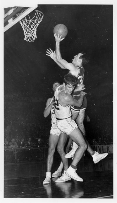 University of Kentucky; Basketball; UK vs. [Unknown]; Opponent #32 knocks over a Wildcat