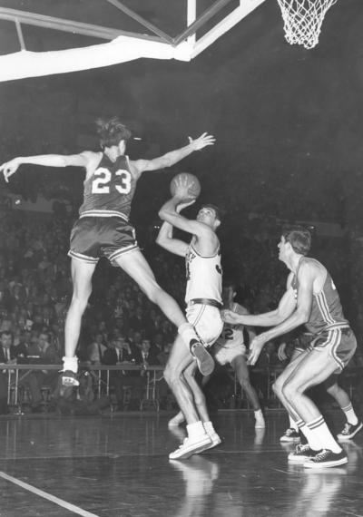 University of Kentucky; Basketball; UK vs. [Unknown]; Kentucky #34 sells his opponent on a pump fake
