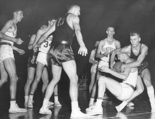 University of Kentucky; Basketball; UK vs. [Unknown]; A fierce battle for possession