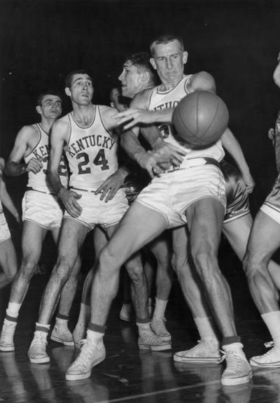 University of Kentucky; Basketball; UK vs. [Unknown]; The ball ricochets off the hand of a Wildcat