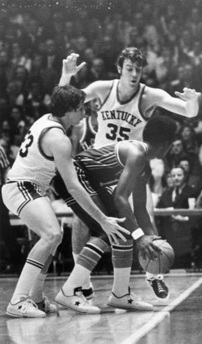 University of Kentucky; Basketball; UK vs. [Unknown]; Two Kentucky players trap an opponent
