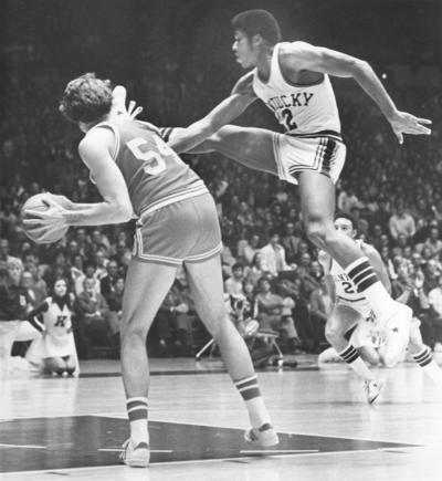 University of Kentucky; Basketball; UK vs. [Unknown]; An opponent holds on to the ball