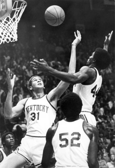 University of Kentucky; Basketball; UK vs. [Unknown]; Three Kentucky players combine for a rebound