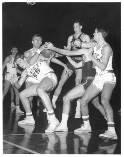 University of Kentucky; Basketball; UK vs. Auburn; Kentucky #55 gets knocked over while fighting for the ball