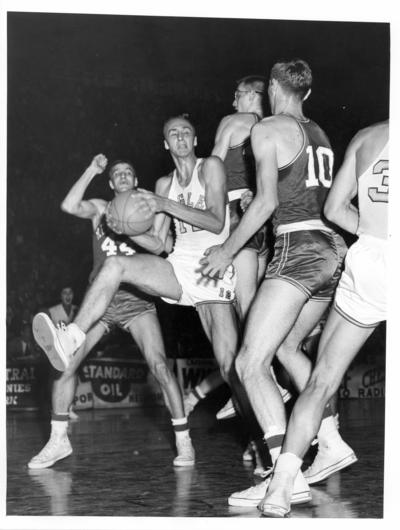 University of Kentucky; Basketball; UK vs. [Unknown] Eagles; Three Kentucky players trying to trap their opponent