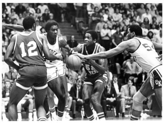 University of Kentucky; Basketball; UK vs. East Tennessee; Several players converge on a loose ball