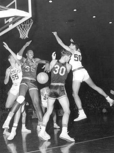 University of Kentucky; Basketball; UK vs. Illinois; Kentucky #50 bobbles the ball while going up for a dunk