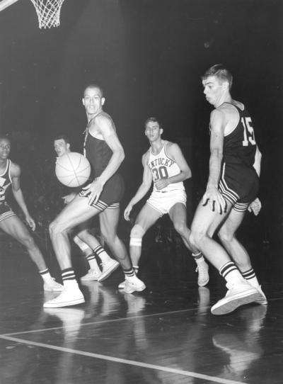 University of Kentucky; Basketball; UK vs. Iowa State; The ball accidentally bounces off someone's foot