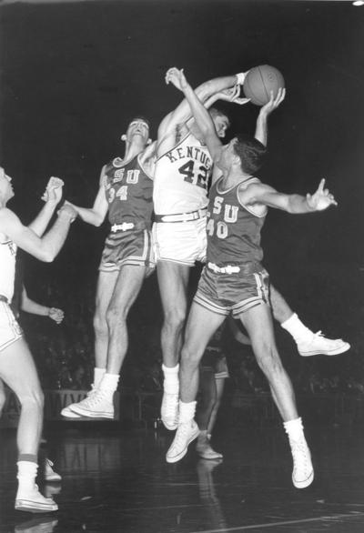 University of Kentucky; Basketball; UK vs. Louisiana State; Kentucky #42 fights off two defenders to claim a rebound