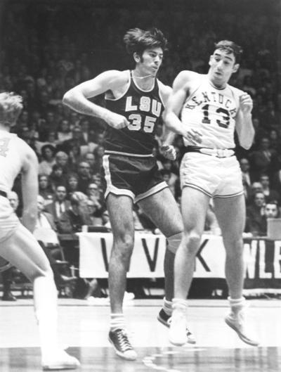 University of Kentucky; Basketball; UK vs. Louisiana State; Two players run up court