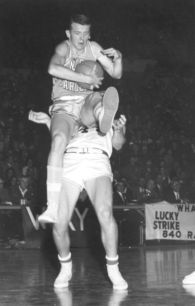 University of Kentucky; Basketball; UK vs. North Carolina; A North Carolina player accidentally knocks over a Kentucky player