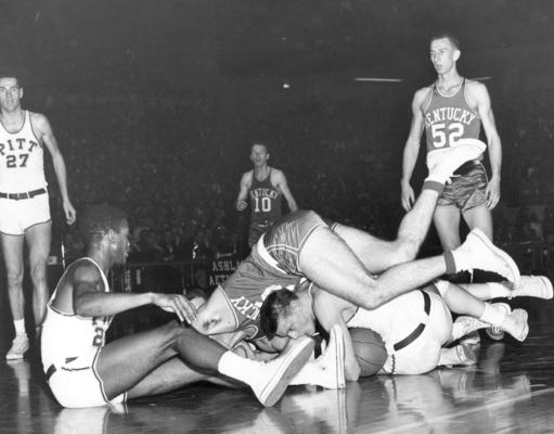 University of Kentucky; Basketball; UK vs. Pitt; Four players in a heap on the floor