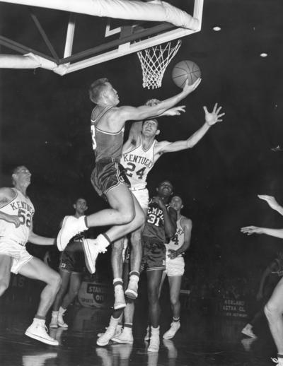 University of Kentucky; Basketball; UK vs. Temple; A Temple player attempts a lay-up in heavy traffic