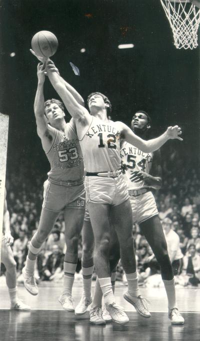 University of Kentucky; Basketball; UK vs. Tennessee (Volunteers); A Tennessee player reaches over Tom Parker's back