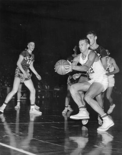 University of Kentucky; Basketball; UK vs. Tulane; A Kentucky player struggles to maintain possession