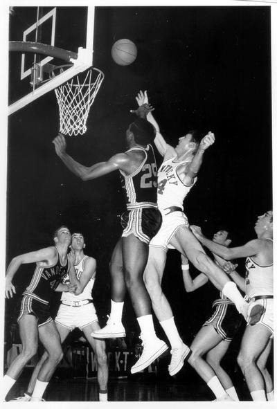 University of Kentucky; Basketball; UK vs. Vanderbilt; A Kentucky player shoots a flying one handed jump shot