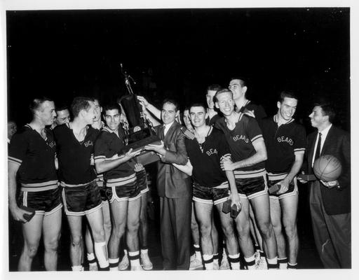 University of Kentucky; Basketball; UK vs. UK Invitational Tournament; Bears team and its coach holding a championship trophy