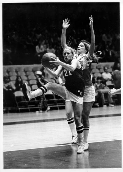 University of Kentucky; Basketball; Women's; UK #21 gets the rebound in front of her opponent