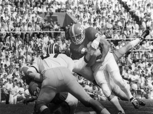 University of Kentucky; Football; Game Scenes; Player #32 being tackled