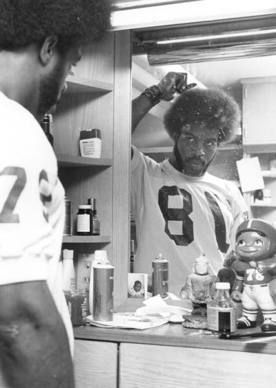University of Kentucky; Football; Individual Players; Player from #3773 using an afro pick