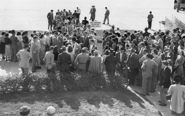 University of Kentucky; Football; Miscellaneous; A crowd gathers at the airfield