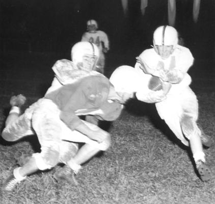 University of Kentucky; Football; Miscellaneous; Football players covered with mud