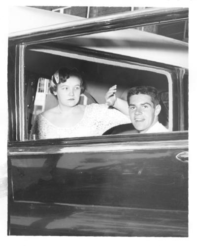 Wedding; Bride and groom in the car