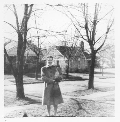 Family and Friends; Woman at a residential road side